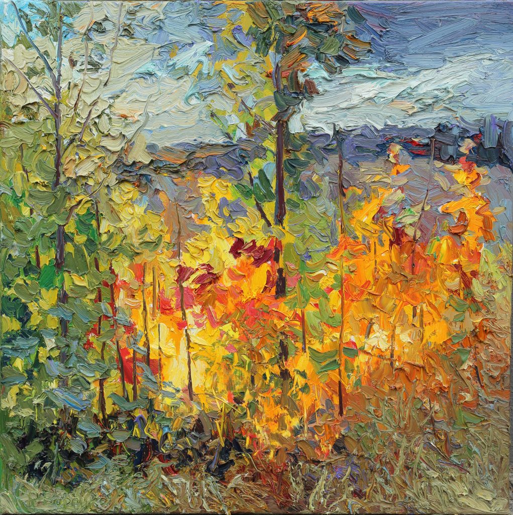 Oil painting of young maple trees with fiery red and orange leaves under dramatic autumn clouds with glimpses of blue sky.