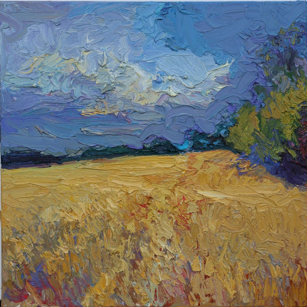 Oil painting of an evening landscape with dark blue storm clouds above a golden wheat field and distant oak trees.