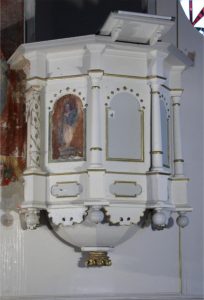 Detail of the restored pulpit with painted panel and architectural ornamentation, part of the pulpit altar in the church of Tauche, Brandenburg